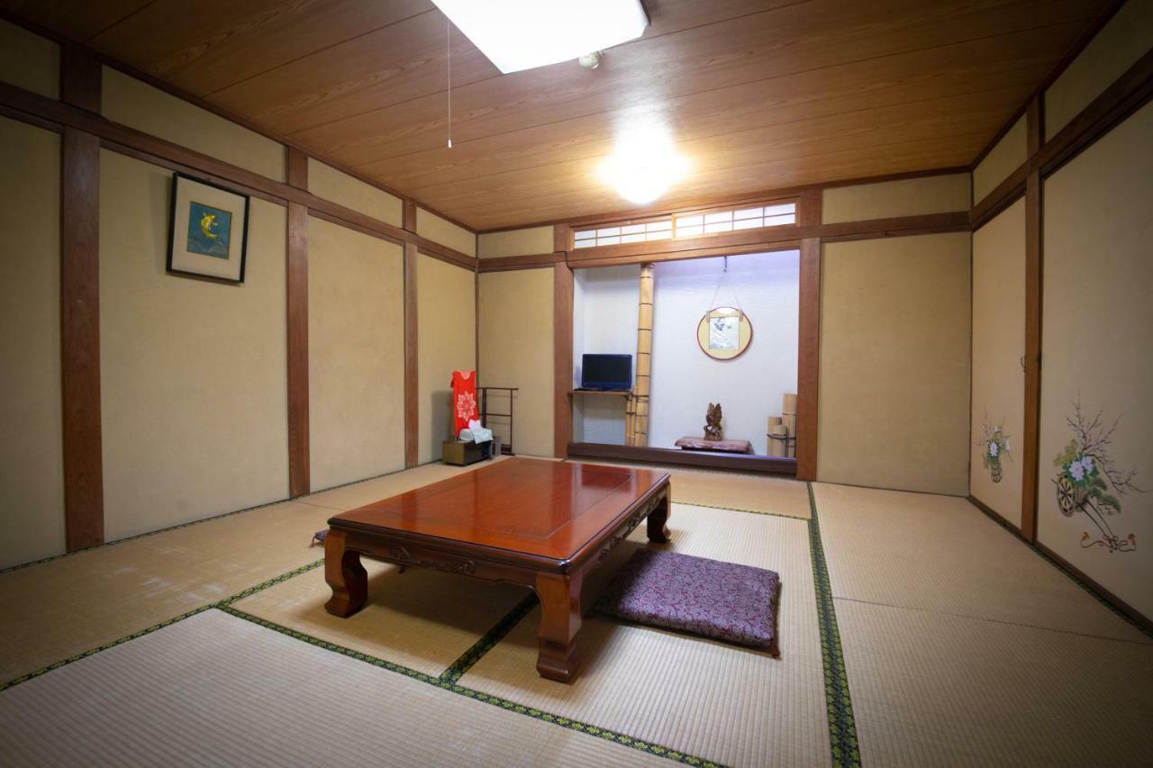 Kikaku Ryokan Beppu Buitenkant foto